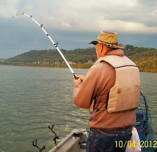 MY brother's rod tip bending over as he was fighting a  21 pound Flathead catfish Oct. 4th. 2012!!